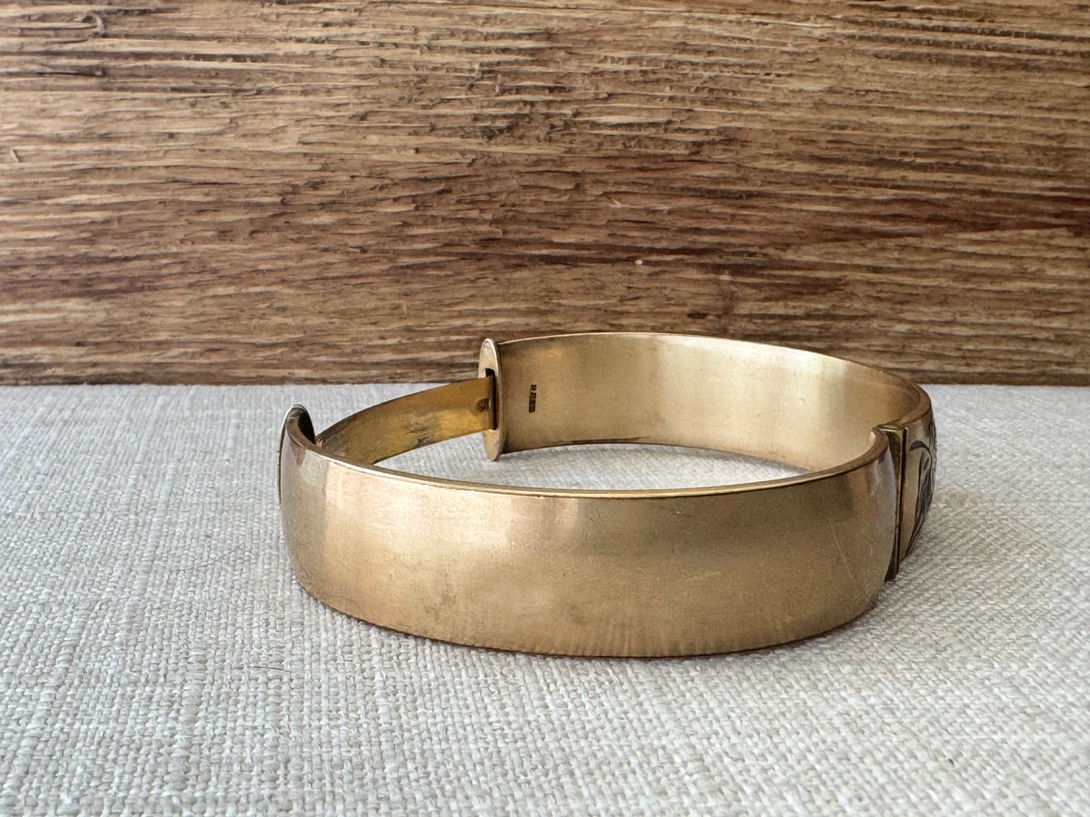 Vintage 1950’s Rolled Gold Bangle Bracelet with Garnett Flowers