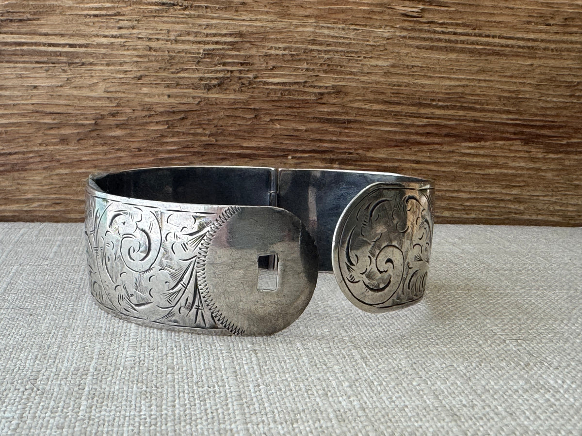 1936 Etched Sterling Silver Bangle Bracelet with Crossover Closure