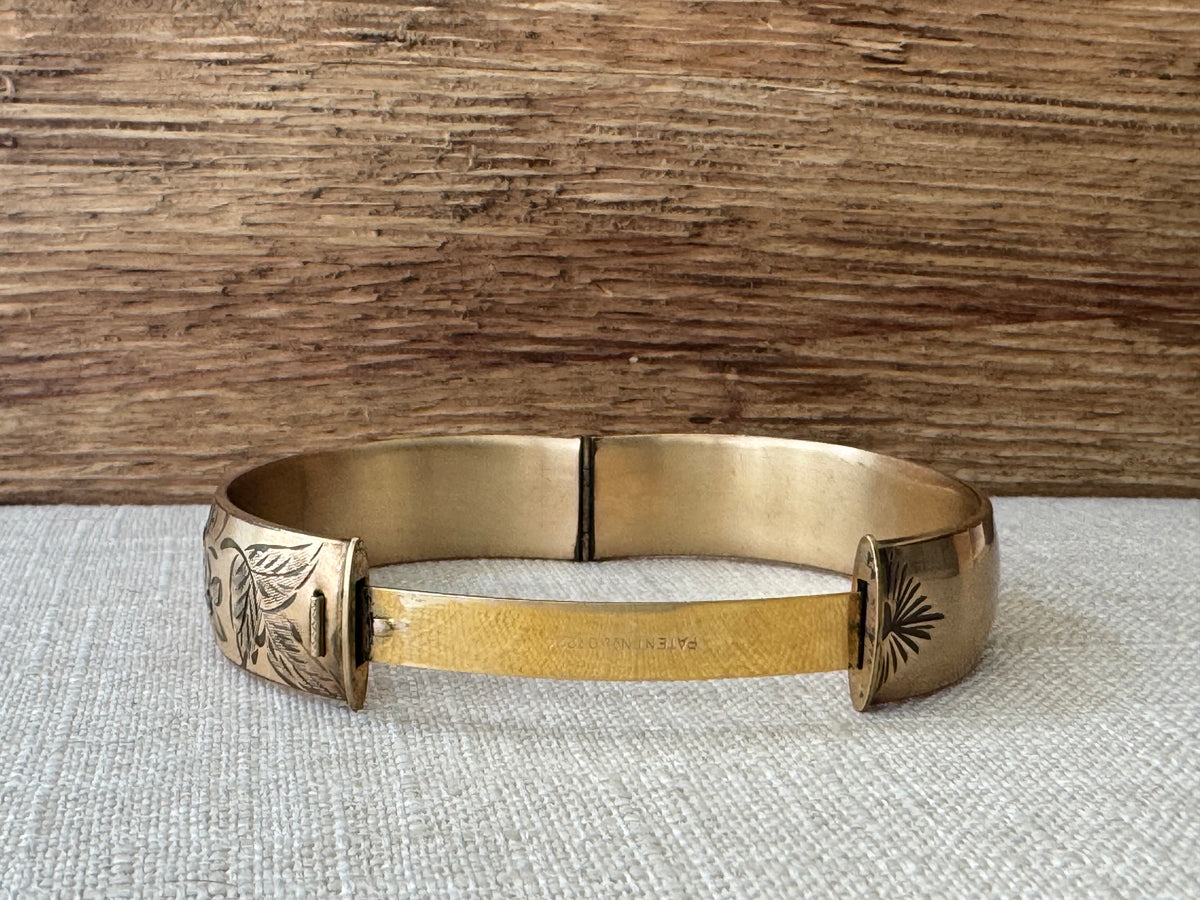 Vintage 1950’s Rolled Gold Bangle Bracelet with Garnett Flowers